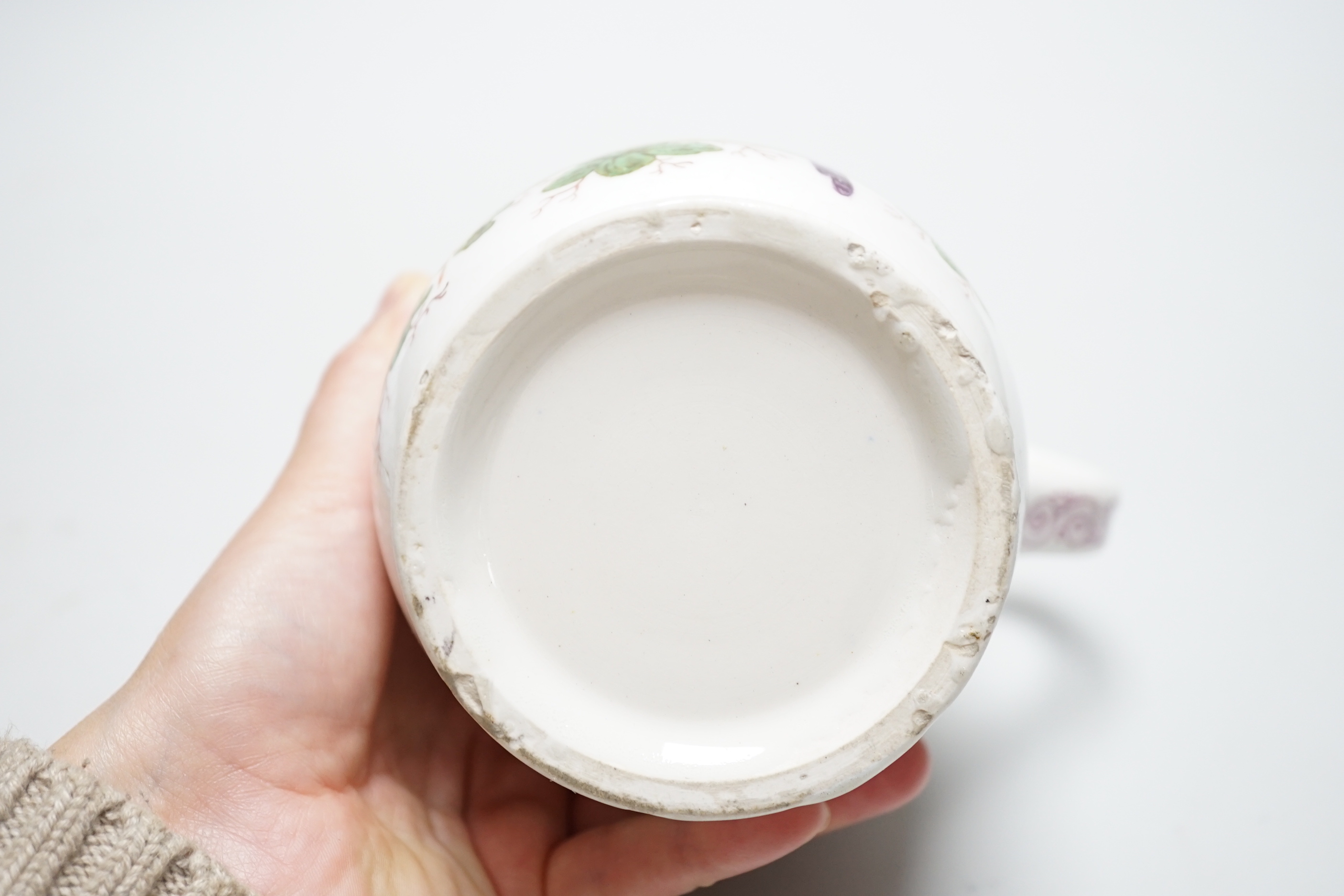 A large 18th century Bow ‘Fantastic Birds’ porcelain mug, 15cm (a.f)